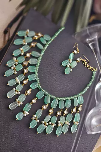 Gold plated long jade necklace