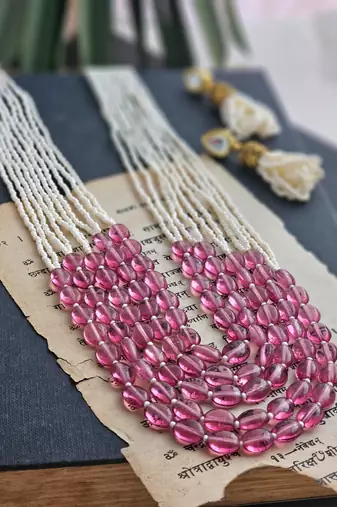 Dawn multi-strand long beaded necklace with pink glass stones