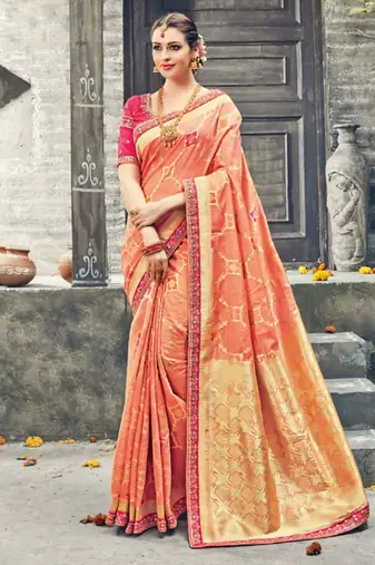 Pure silk party wear saree in peach color with embroidery work