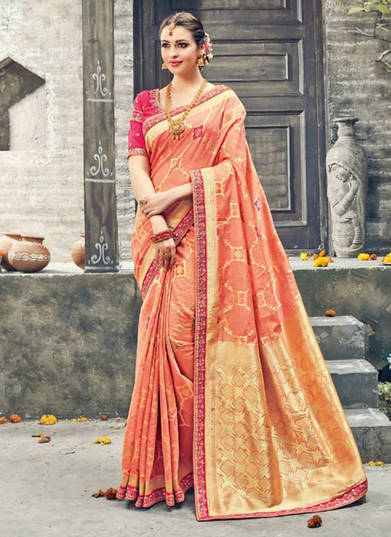 Pure silk party wear saree in peach color with embroidery work