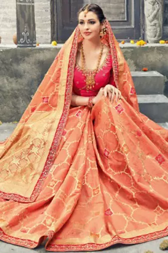 Pure silk party wear saree in peach color with embroidery work