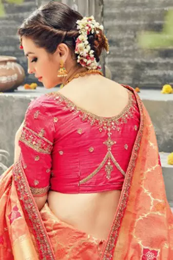 Pure silk party wear saree in peach color with embroidery work