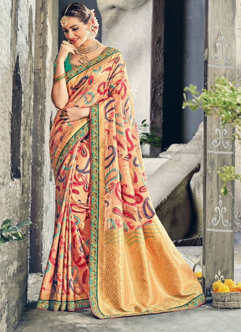 Pure silk party wear saree in peach color with embroidery work