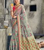 Pure silk party wear saree in grey color with embroidery work