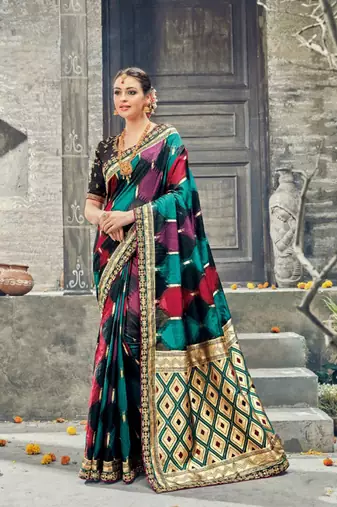 Pure silk party wear saree in black color with embroidery work