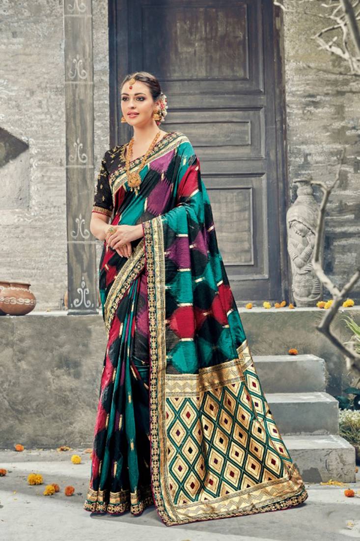 Pure silk party wear saree in black color with embroidery work