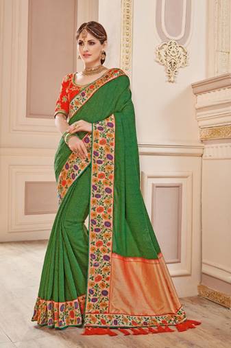 Pure silk party wear saree in green color with embroidery work