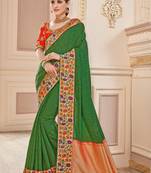 Pure silk party wear saree in green color with embroidery work
