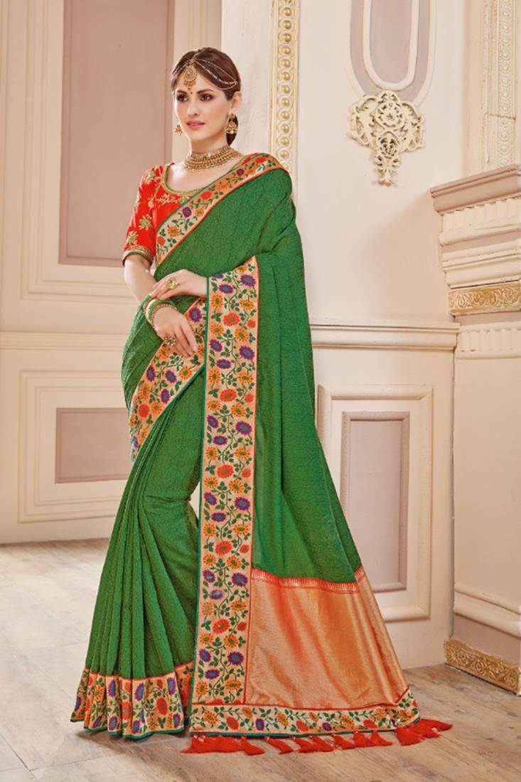 Pure silk party wear saree in green color with embroidery work