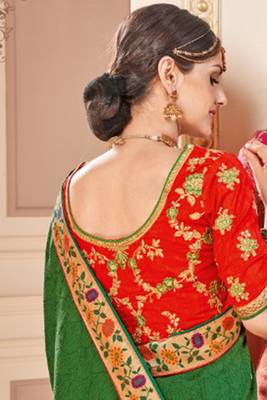 Pure silk party wear saree in green color with embroidery work 2