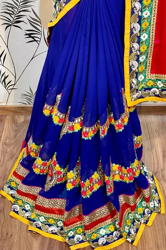 Georgette party wear saree in red & blue with embroidery work & crystal stone work