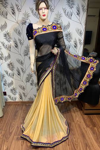 Fancy fabric party wear saree in black with embroidery work & crystal stone work