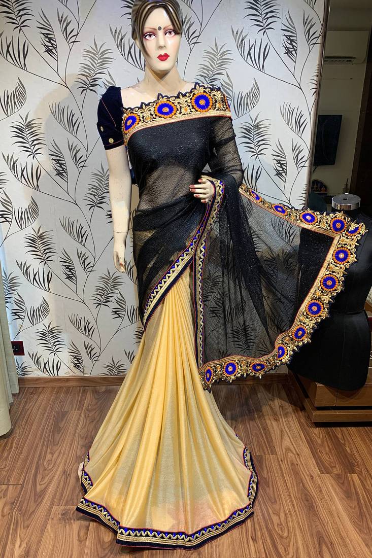 Fancy fabric party wear saree in black with embroidery work & crystal stone work