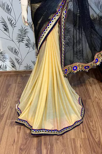 Fancy fabric party wear saree in black with embroidery work & crystal stone work