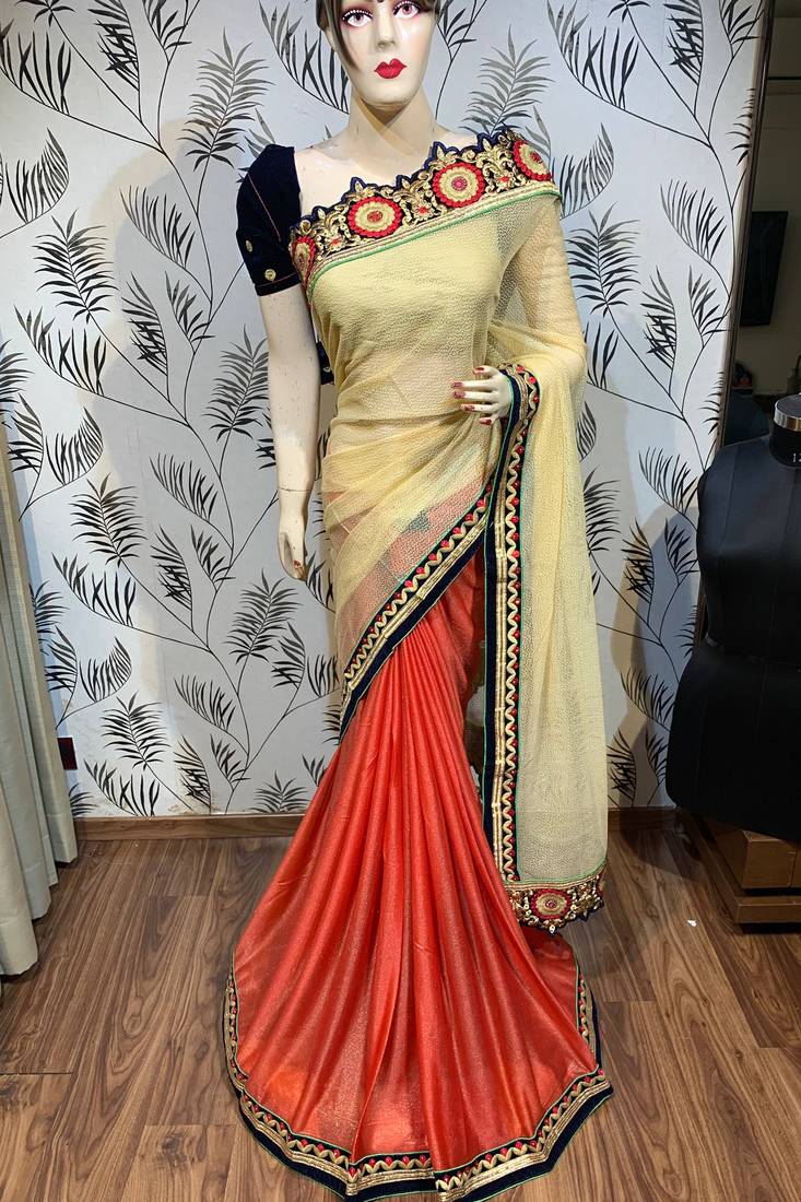 Fancy fabric party wear saree in cream with embroidery work & crystal stone work