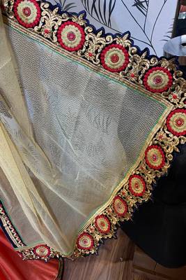 Fancy fabric party wear saree in cream with embroidery work & crystal stone work 2