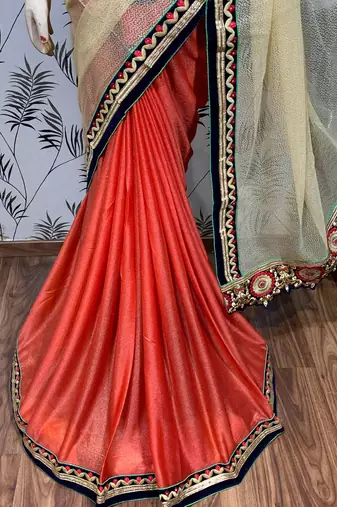 Fancy fabric party wear saree in cream with embroidery work & crystal stone work