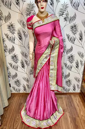 Fancy fabric party wear saree in pink with embroidery work & crystal stone work