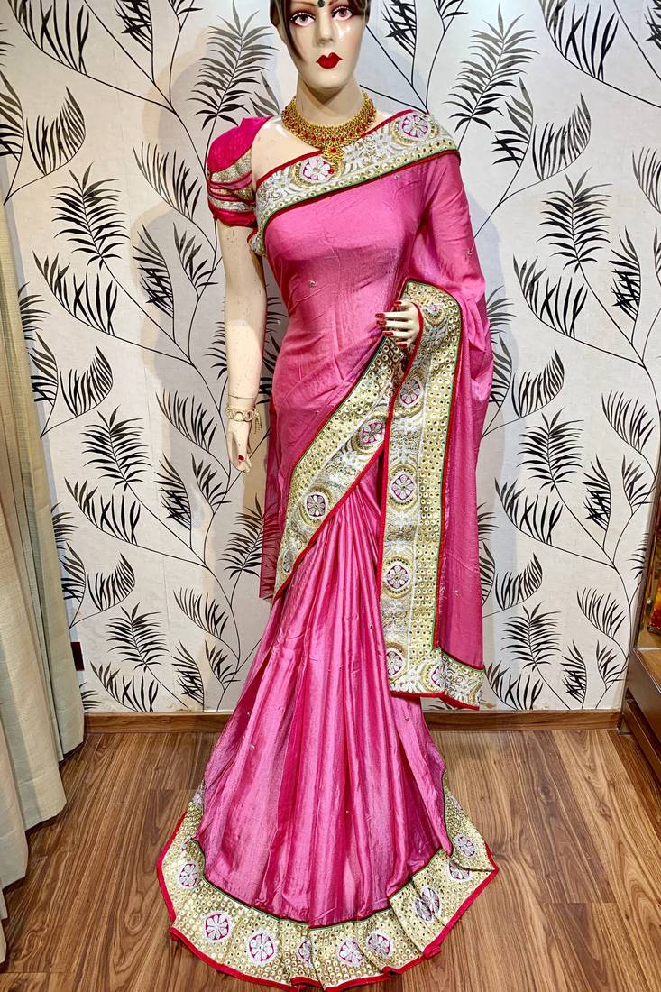 Fancy fabric party wear saree in pink with embroidery work & crystal stone work