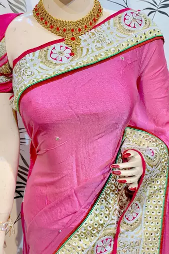 Fancy fabric party wear saree in pink with embroidery work & crystal stone work