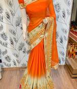 Chinon chiffon wedding wear saree in orange with embroidery work & crystal stone work