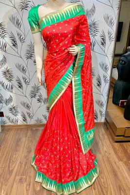 Pure silk party wear saree in red color with embroidery work 1