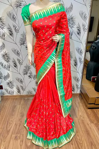 Pure silk party wear saree in red color with embroidery work