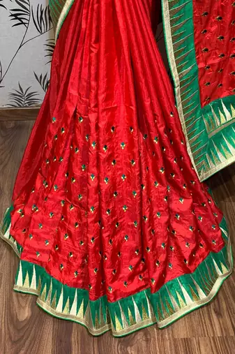 Pure silk party wear saree in red color with embroidery work