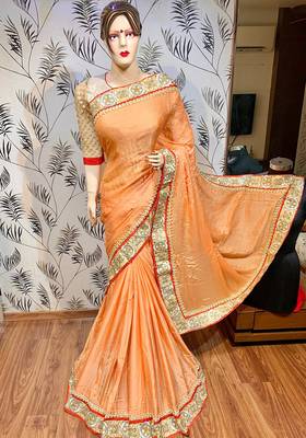 Fancy fabric party wear saree in peach with embroidery work & crystal stone work 2