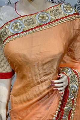 Fancy fabric party wear saree in peach with embroidery work & crystal stone work 3