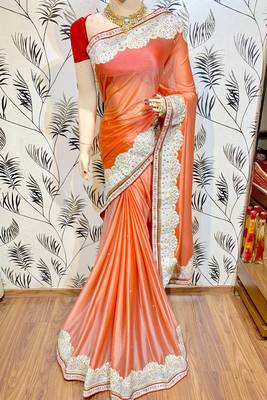 Fancy fabric silk party wear saree in peach with embroidery work & crystal stone work 1