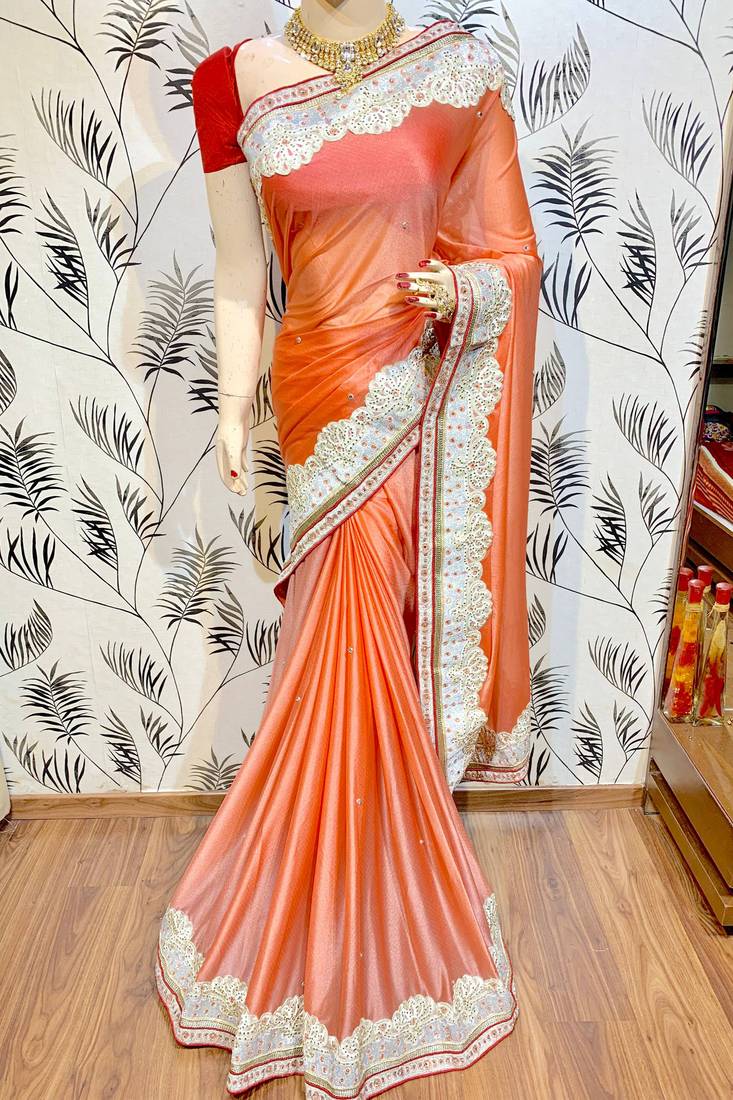 Fancy fabric silk party wear saree in peach with embroidery work & crystal stone work