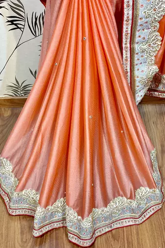 Fancy fabric silk party wear saree in peach with embroidery work & crystal stone work