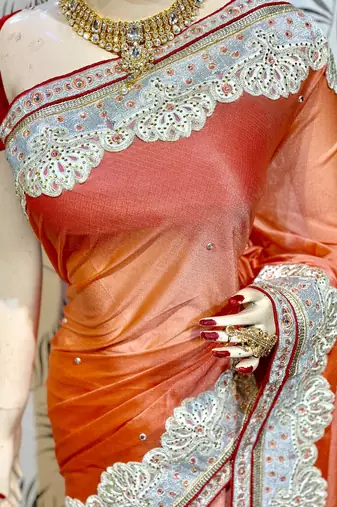 Fancy fabric silk party wear saree in peach with embroidery work & crystal stone work
