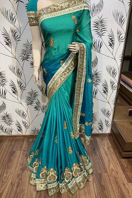 Pure shadow silk party wear saree in green with embroidery work & crystal stone work 1