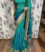 Pure shadow silk party wear saree in green with embroidery work & crystal stone work
