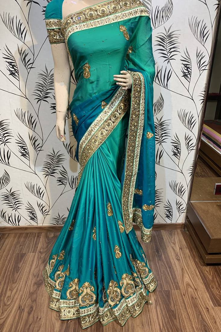 Pure shadow silk party wear saree in green with embroidery work & crystal stone work
