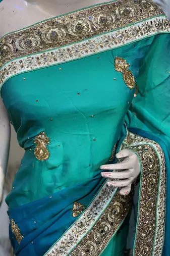 Pure shadow silk party wear saree in green with embroidery work & crystal stone work