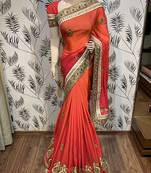 Pure shadow silk party wear saree in orange with embroidery work & crystal stone work