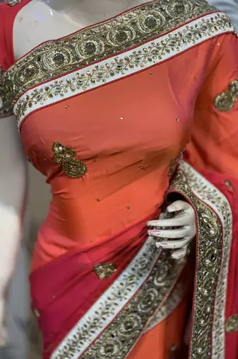 Pure shadow silk party wear saree in orange with embroidery work & crystal stone work