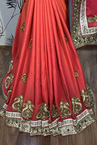 Pure shadow silk party wear saree in orange with embroidery work & crystal stone work