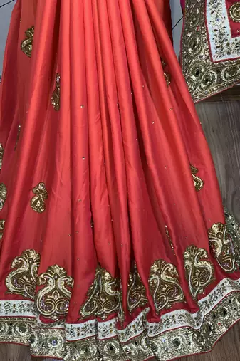 Pure shadow silk party wear saree in orange with embroidery work & crystal stone work