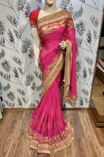 Pure georgette party wear saree in pink with embroidery work & crystal stone work