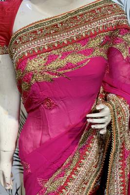 Pure georgette party wear saree in pink with embroidery work & crystal stone work 2