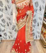 Pure georgette party wear saree in red with embroidery work & crystal stone work
