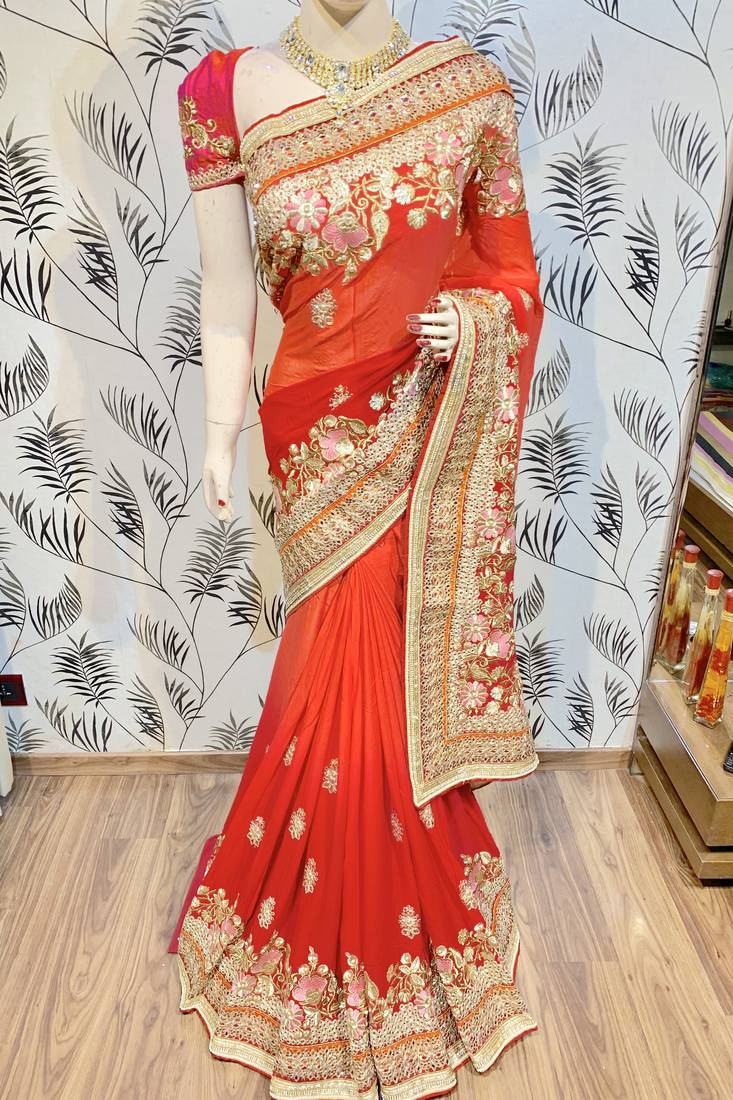 Pure georgette party wear saree in red with embroidery work & crystal stone work
