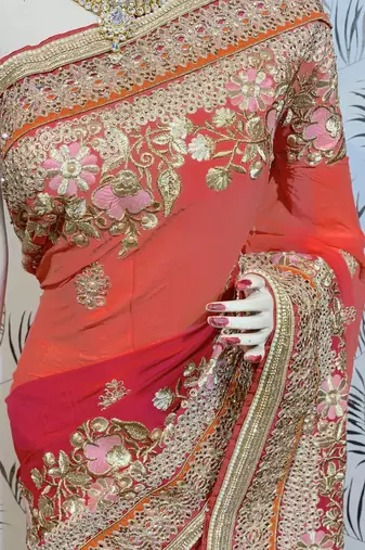 Pure georgette party wear saree in red with embroidery work & crystal stone work