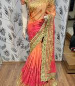 Pure chiffon wedding wear saree in orange with embroidery work & crystal stone work