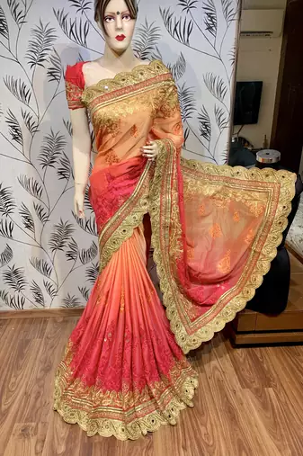 Pure chiffon wedding wear saree in orange with embroidery work & crystal stone work