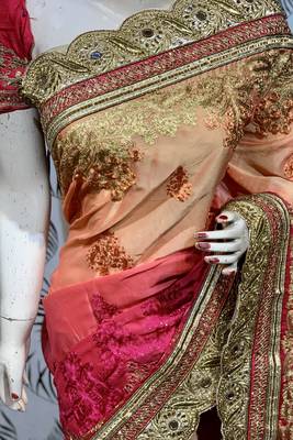 Pure chiffon wedding wear saree in orange with embroidery work & crystal stone work 4
